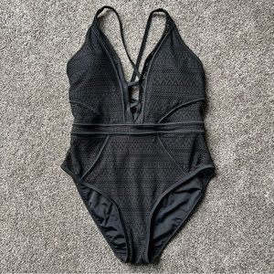 Women’s one piece swim suit.